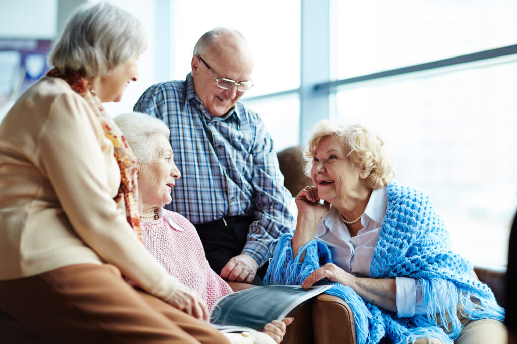 group of happy seniors talking